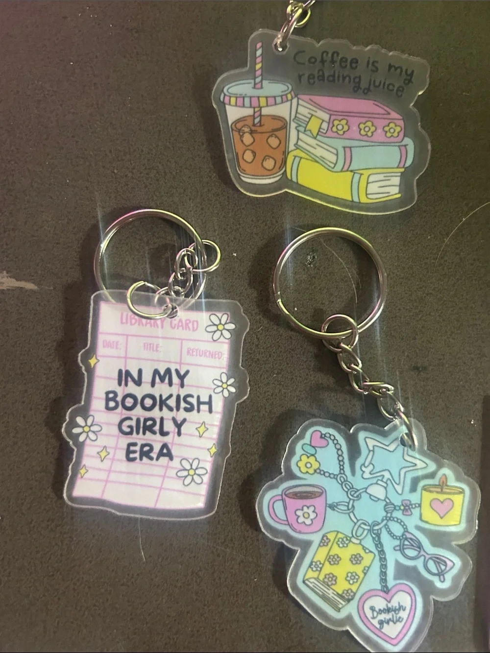 Book club keychain and bookmark tchotchkes